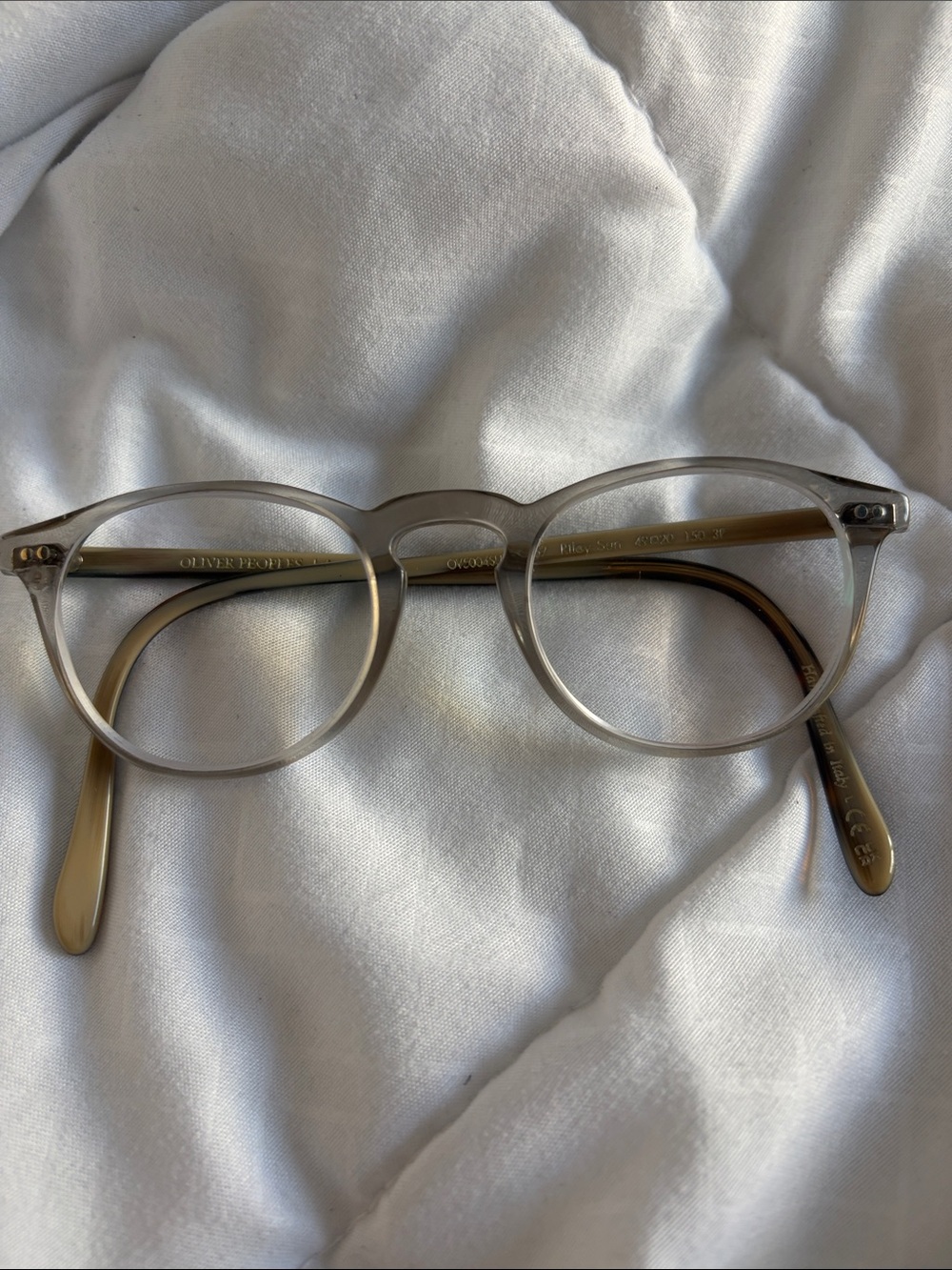 Oliver Peoples Translucent Gray Round Eyeglasses